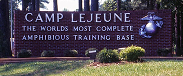 Plaque at entrance to Camp Lejeune, it reads "Camp Lejeune the worlds most complete amphinous training base"